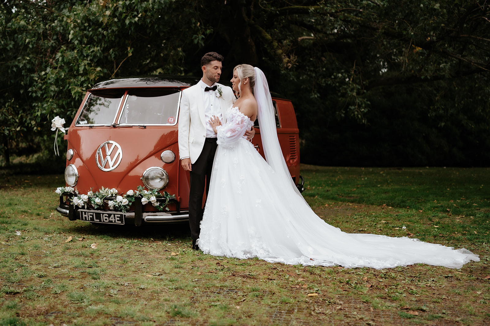 Bride and groom portrait with vintage VW camper van at a Brentwood wedding — editorial styling and polished photography by Lily & White